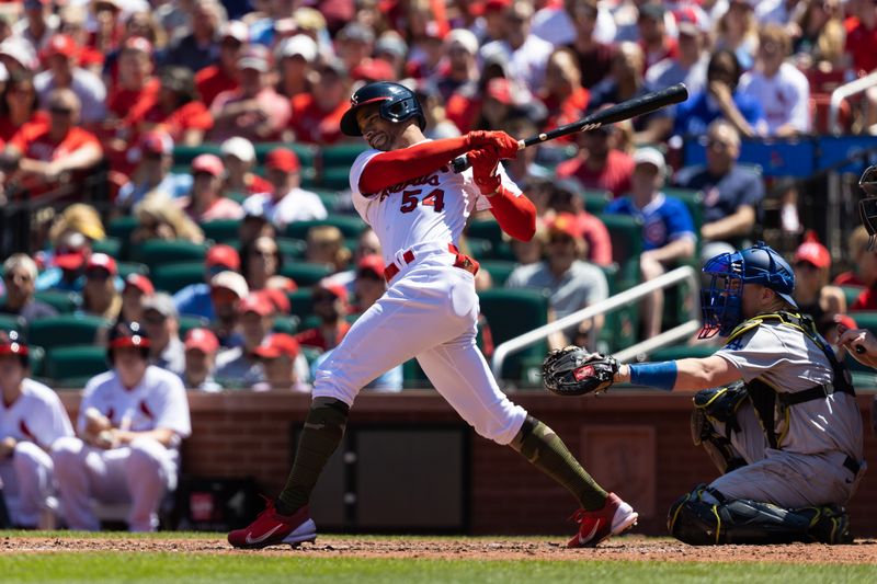 May 21, 2023; St. Louis, Missouri, USA;  St. Louis Cardinals  scar Mercado (54) hits a single against the Los Angeles Dodgers in the fourth inning at Busch Stadium. Mandatory Credit: Zach Dalin-USA TODAY Sports