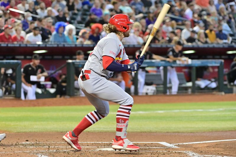 Jul 26, 2023; Phoenix, Arizona, USA;  St. Louis Cardinals second baseman Brendan Donovan (33) singles in the third inning against the Arizona Diamondbacks at Chase Field. Mandatory Credit: Matt Kartozian-USA TODAY Sports