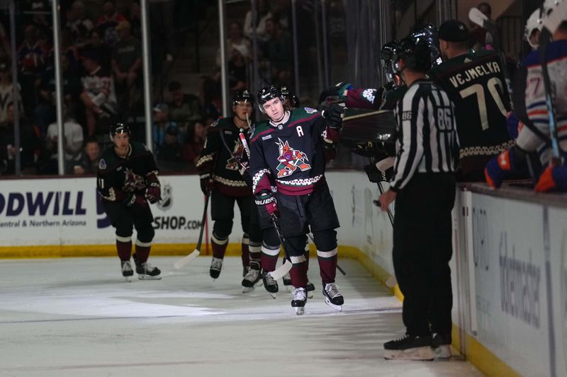 Feb 19, 2024; Tempe, Arizona, USA; Arizona Coyotes right wing Clayton Keller (9) celebrates a goal against the Edmonton Oilers during the second period at Mullett Arena. Mandatory Credit: Joe Camporeale-USA TODAY Sports