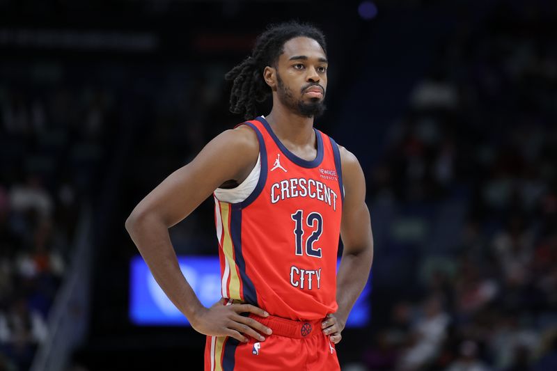 NEW ORLEANS, LOUISIANA - DECEMBER 12: Antonio Reeves #12 of the New Orleans Pelicans reacts against the Sacramento Kings during a game at the Smoothie King Center on December 12, 2024 in New Orleans, Louisiana. NOTE TO USER: User expressly acknowledges and agrees that, by downloading and or using this Photograph, user is consenting to the terms and conditions of the Getty Images License Agreement. (Photo by Jonathan Bachman/Getty Images)