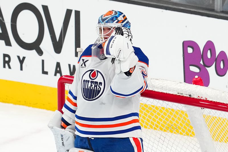 Apr 1, 2025; Las Vegas, Nevada, USA; Edmonton Oilers goaltender Calvin Pickard (30) celebrates after the Oilers defeat the Vegas Golden Knights at T-Mobile Arena. Mandatory Credit: Stephen R. Sylvanie-Imagn Images