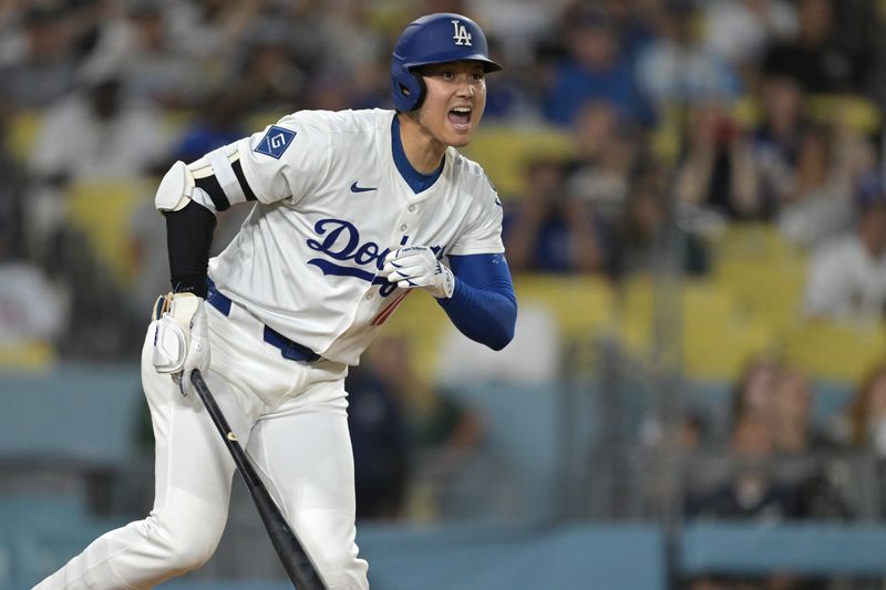 May 21, 2025; Los Angeles, California, USA;  Los Angeles Dodgers designated hitter Shohei Ohtani (17) reacts after hitting a foul ball down the right field line in the eighth inning against the Arizona Diamondbacks at Dodger Stadium. Mandatory Credit: Jayne Kamin-Oncea-Imagn Images