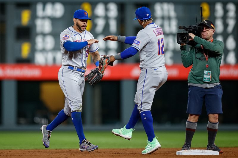 May 26, 2023; Denver, Colorado, USA; New York Mets left fielder Tommy Pham (28) and shortstop Francisco Lindor (12) celebrate after the game against the Colorado Rockies at Coors Field. Mandatory Credit: Isaiah J. Downing-USA TODAY Sports