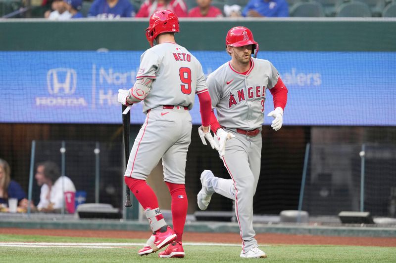 Sep 7, 2024; Arlington, Texas, USA; Los Angeles Angels left fielder Taylor Ward (3) celebrates his home run with shortstop Zach Neto (9) against the Texas Rangers during the first inning at Globe Life Field. Mandatory Credit: Jim Cowsert-Imagn Images