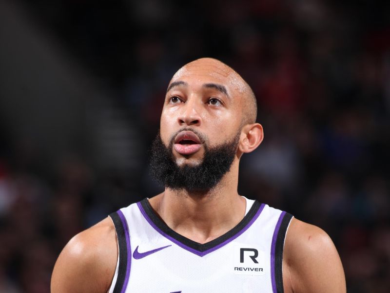 PORTLAND, OR - NOVEMBER 29: Jordan McLaughlin #3 of the Sacramento Kings shoots a free throw during the game against the Portland Trail Blazers during the Emirates NBA Cup on November 29, 2024 at the Moda Center Arena in Portland, Oregon. NOTE TO USER: User expressly acknowledges and agrees that, by downloading and or using this photograph, user is consenting to the terms and conditions of the Getty Images License Agreement. Mandatory Copyright Notice: Copyright 2024 NBAE (Photo by Cameron Browne/NBAE via Getty Images)