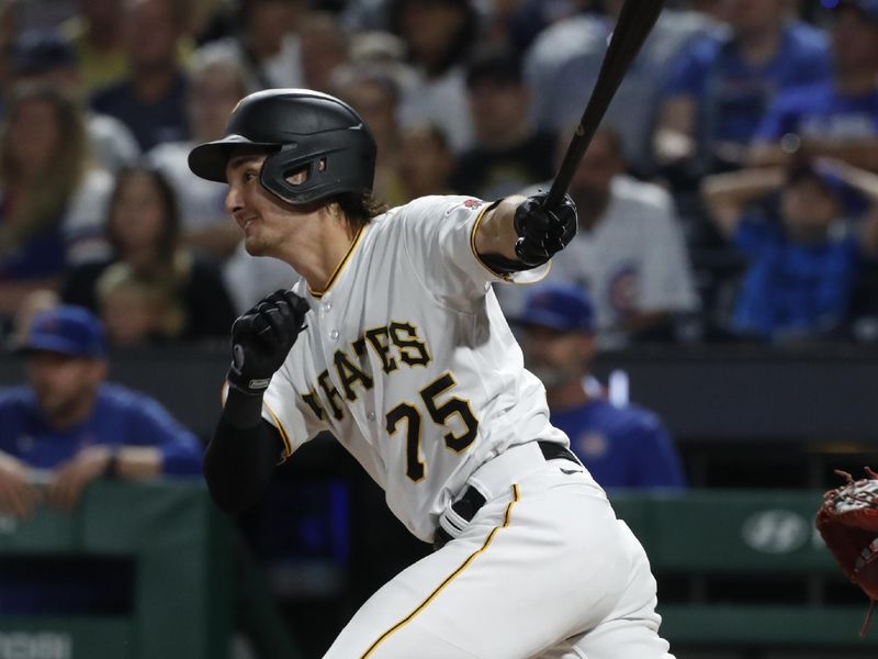 Aug 26, 2023; Pittsburgh, Pennsylvania, USA;  Pittsburgh Pirates shortstop Alika Williams (75) hits an RBI single against the Chicago Cubs during the seventh inning at PNC Park. Mandatory Credit: Charles LeClaire-USA TODAY Sports