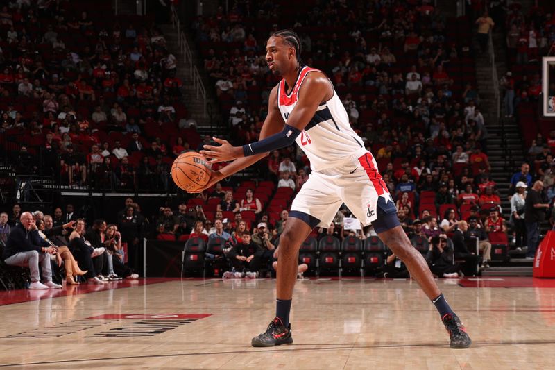 HOUSTON, TX - NOVEMBER 11: Alexandre Sarr #20 of the Washington Wizards handles the ball during the game against the Houston Rockets on November 11, 2024 at the Toyota Center in Houston, Texas. NOTE TO USER: User expressly acknowledges and agrees that, by downloading and or using this photograph, User is consenting to the terms and conditions of the Getty Images License Agreement. Mandatory Copyright Notice: Copyright 2024 NBAE (Photo by KeShawn Ennis/NBAE via Getty Images)