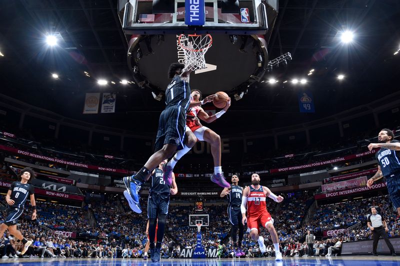 ORLANDO, FL - NOVMEBER 10: Jordan Poole #13 of the Washington Wizards drives to the basket during the game against the Orlando Magic on November 10, 2024 at Kia Center in Orlando, Florida. NOTE TO USER: User expressly acknowledges and agrees that, by downloading and or using this photograph, User is consenting to the terms and conditions of the Getty Images License Agreement. Mandatory Copyright Notice: Copyright 2024 NBAE (Photo by Fernando Medina/NBAE via Getty Images)