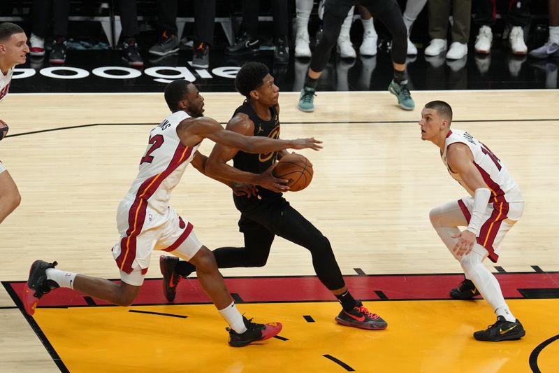 MIAMI, FL - APRIL 26: De'Andre Hunter #12 of the Cleveland Cavaliers drives to the basket during the game against the Miami Heat during Round 1 Game 3 of the 2025 NBA Playoffs on April 26, 2025 at Kaseya Center in Miami, Florida. NOTE TO USER: User expressly acknowledges and agrees that, by downloading and or using this Photograph, user is consenting to the terms and conditions of the Getty Images License Agreement. Mandatory Copyright Notice: Copyright 2025 NBAE(Photo by Eric Espada/NBAE via Getty Images)