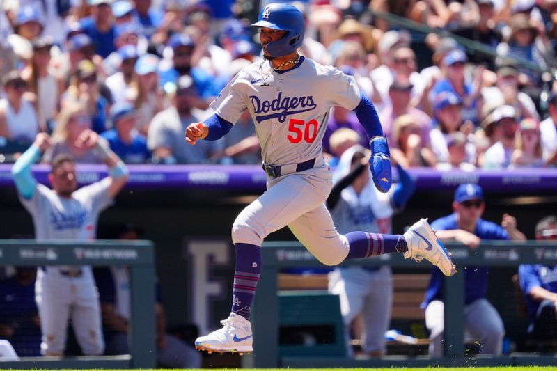 Jun 26, 2025; Denver, Colorado, USA; Los Angeles Dodgers shortstop Mookie Betts (50) heads home to score the go ahead run in the sixth inning against the Colorado Rockies at Coors Field. Mandatory Credit: Ron Chenoy-Imagn Images
