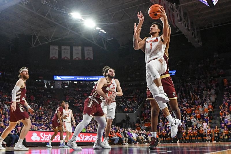 Jan 13, 2024; Clemson, South Carolina, USA; Clemson Tigers guard Chase Hunter (1) scores against the Boston College Eagles during the second half at Littlejohn Coliseum. Mandatory Credit: Ken Ruinard-USA TODAY Sports