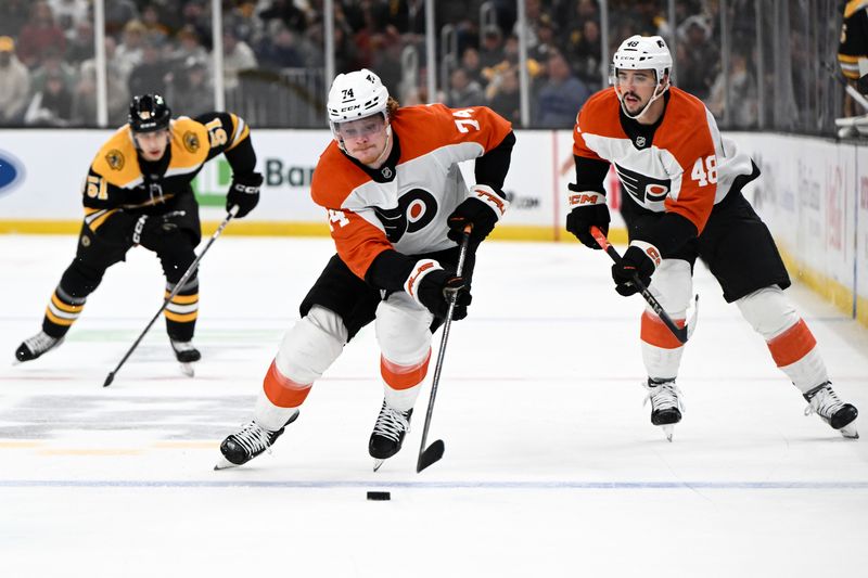 Oct 29, 2024; Boston, Massachusetts, USA; Philadelphia Flyers right wing Owen Tippett (74) skates with the puck against the Boston Bruins during the second period at TD Garden. Mandatory Credit: Brian Fluharty-Imagn Images