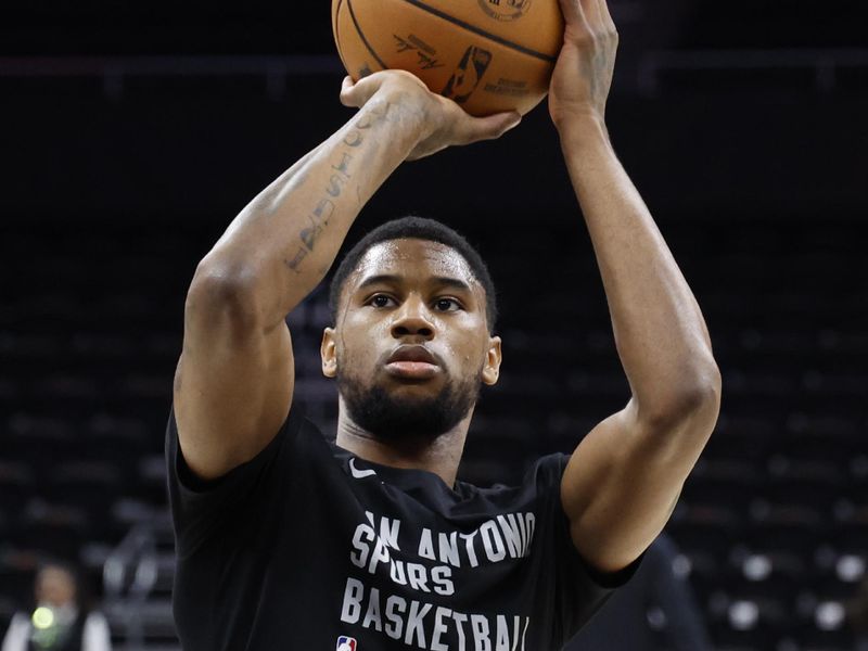 SAN ANTONIO, TX - MARCH 17:  Blake Wesley #14 of the San Antonio Spurs takes warm up shots before their game against the Brooklyn Nets at Moody Center on March 17, 2024 in San Antonio, Texas. NOTE TO USER: User expressly acknowledges and agrees that, by downloading and or using this photograph, User is consenting to terms and conditions of the Getty Images License Agreement. (Photo by Ronald Cortes/Getty Images)