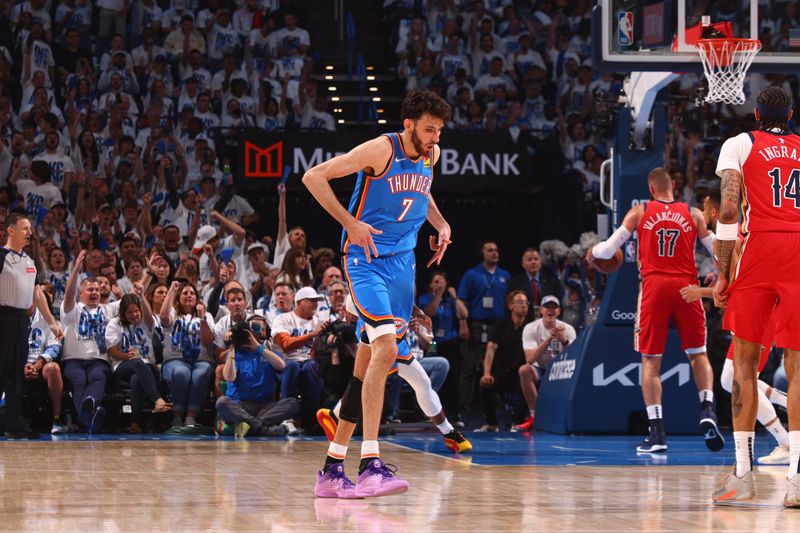 OKLAHOMA CITY, OK - APRIL 24: Chet Holmgren #7 of the Oklahoma City Thunder celebrates during the game against the New Orleans Pelicans during Round 1 Game 2 of the 2024 NBA Playoffs on April 24, 2024 at Paycom Arena in Oklahoma City, Oklahoma. NOTE TO USER: User expressly acknowledges and agrees that, by downloading and or using this photograph, User is consenting to the terms and conditions of the Getty Images License Agreement. Mandatory Copyright Notice: Copyright 2024 NBAE (Photo by Zach Beeker/NBAE via Getty Images)