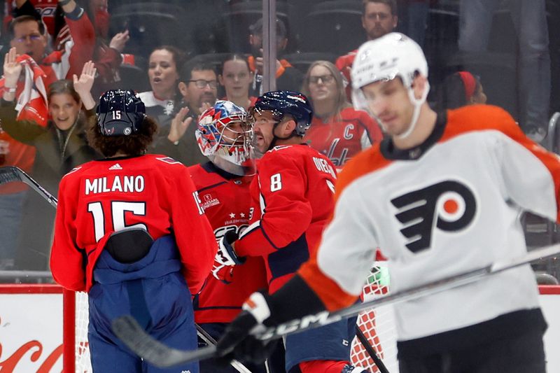 Mar 1, 2024; Washington, District of Columbia, USA; Washington Capitals left wing Alex Ovechkin (8) celebrates with Capitals goaltender Charlie Lindgren (79) after their game against the Philadelphia Flyers at Capital One Arena. Mandatory Credit: Geoff Burke-USA TODAY Sports