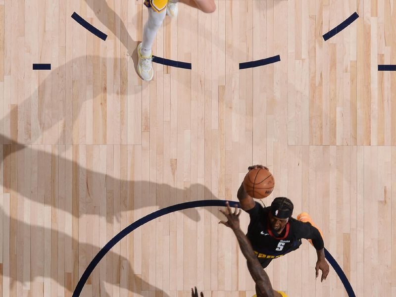 DENVER, CO - APRIL 22: Kentavious Caldwell-Pope #5 of the Denver Nuggets drives to the basket during the game against the Los Angeles Lakers on April 22, 2024 at the Ball Arena in Denver, Colorado. NOTE TO USER: User expressly acknowledges and agrees that, by downloading and/or using this Photograph, user is consenting to the terms and conditions of the Getty Images License Agreement. Mandatory Copyright Notice: Copyright 2024 NBAE (Photo by Bart Young/NBAE via Getty Images)