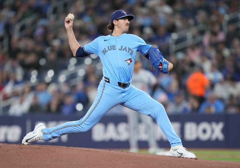 May 11, 2024; Toronto, Ontario, CAN; Toronto Blue Jays starting pitcher Kevin Gausman (34) throws a pitch against the Minnesota Twins during the first inning at Rogers Centre. Mandatory Credit: Nick Turchiaro-USA TODAY Sports