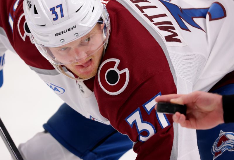 Dec 3, 2024; Buffalo, New York, USA;  Colorado Avalanche center Casey Mittelstadt (37) waits for the linesman to drop the puck for a face-off during the first period against the Buffalo Sabres at KeyBank Center. Mandatory Credit: Timothy T. Ludwig-Imagn Images