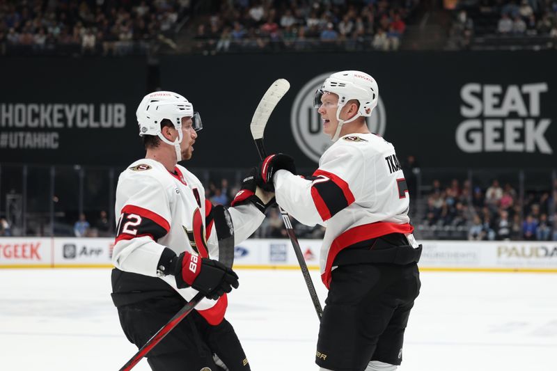 Oct 22, 2024; Salt Lake City, Utah, USA; Ottawa Senators left wing Brady Tkachuk (7) reacts to scoring a goal with center Shane Pinto (12) against the Utah Hockey Club during the first period at Delta Center. Mandatory Credit: Rob Gray-Imagn Images