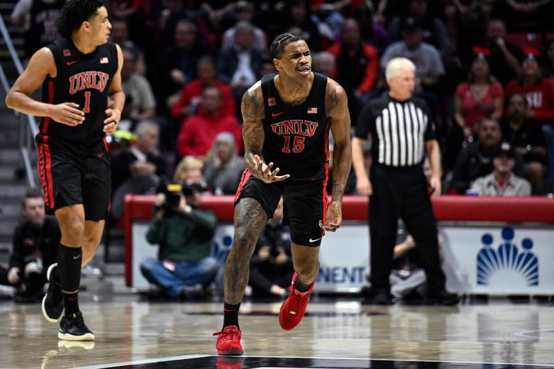 Jan 6, 2024; San Diego, California, USA; UNLV Rebels guard Luis Rodriguez (15) reacts after a basket against the San Diego State Aztecs during the first half at Viejas Arena. Mandatory Credit: Orlando Ramirez-USA TODAY Sports