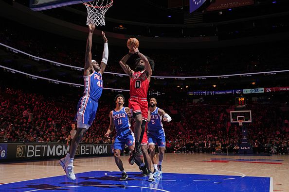PHILADELPHIA, PA - JANUARY 2: Coby White #0 of the Chicago Bulls drives to the basket during the game against the Philadelphia 76ers on January 2, 2024 at the Wells Fargo Center in Philadelphia, Pennsylvania NOTE TO USER: User expressly acknowledges and agrees that, by downloading and/or using this Photograph, user is consenting to the terms and conditions of the Getty Images License Agreement. Mandatory Copyright Notice: Copyright 2023 NBAE (Photo by Jesse D. Garrabrant/NBAE via Getty Images)