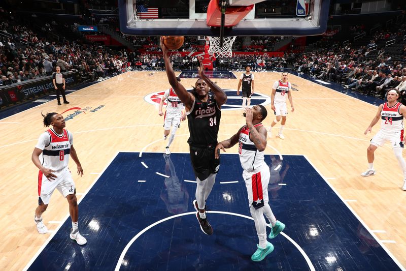 WASHINGTON, DC -? FEBRUARY 26: Jabari Walker #34 of the Portland Trail Blazers drives to basket against the Washington Wizards on February 26, 2025 at Capital One Arena in Washington, DC. NOTE TO USER: User expressly acknowledges and agrees that, by downloading and or using this Photograph, user is consenting to the terms and conditions of the Getty Images License Agreement. Mandatory Copyright Notice: Copyright 2025 NBAE (Photo by Kenny Giarla/NBAE via Getty Images)