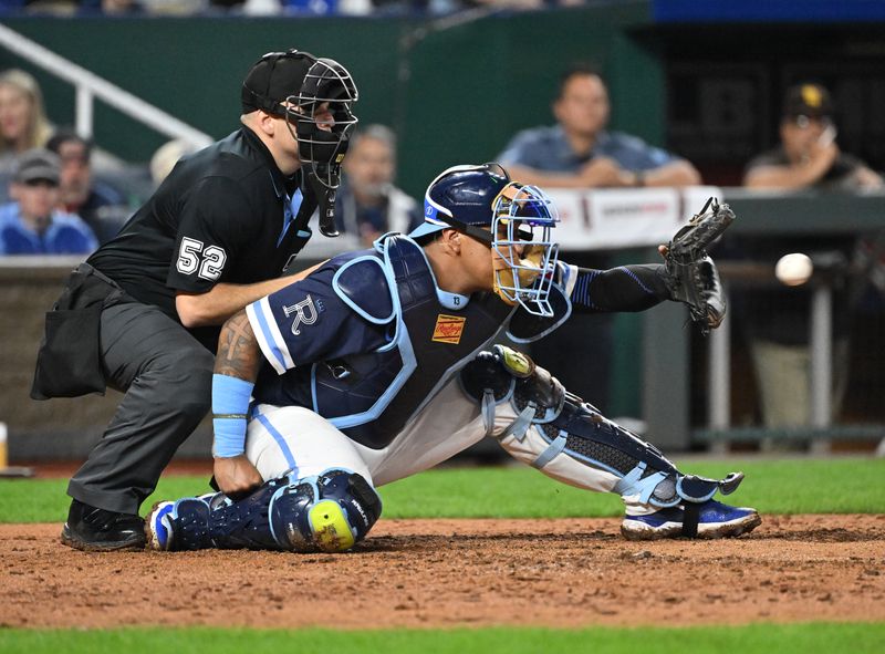 May 31, 2024; Kansas City, Missouri, USA;  Kansas City Royals catcher Salvador Perez (13) receives a pitch in the seventh inning against the San Diego Padres at Kauffman Stadium. Mandatory Credit: Peter Aiken-USA TODAY Sports