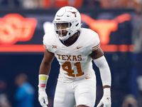 Longhorns Lock Horns with Roadrunners: A Battle of Offense and Defense at DKR