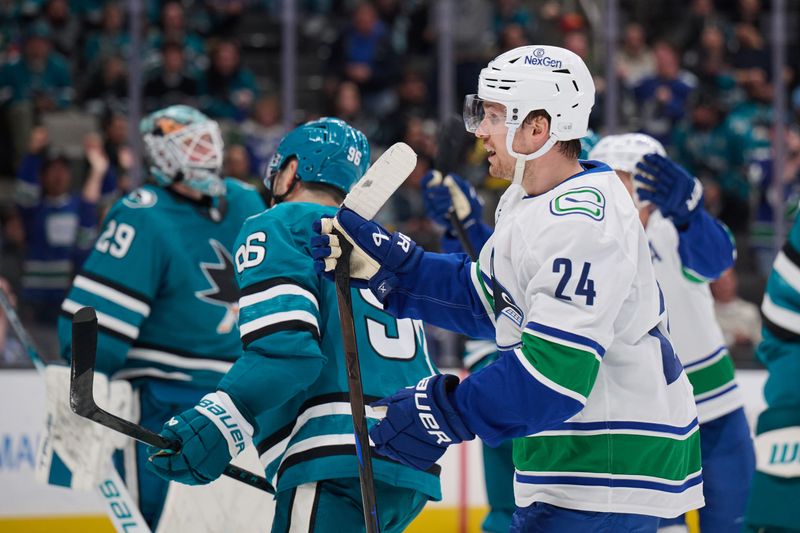 Nov 2, 2024; San Jose, California, USA; Vancouver Canucks center Pius Suter (24) reacts after scoring the game-winning goal against the San Jose Sharks during the third period at SAP Center at San Jose. Mandatory Credit: Robert Edwards-Imagn Images