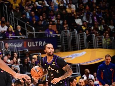 LOS ANGELES, CA - DECEMBER 18:  D'Angelo Russell #1 of the Los Angeles Lakers handles the ball during the game  on December 18, 2023 at Crypto.Com Arena in Los Angeles, California. NOTE TO USER: User expressly acknowledges and agrees that, by downloading and/or using this Photograph, user is consenting to the terms and conditions of the Getty Images License Agreement. Mandatory Copyright Notice: Copyright 2023 NBAE (Photo by Adam Pantozzi/NBAE via Getty Images)