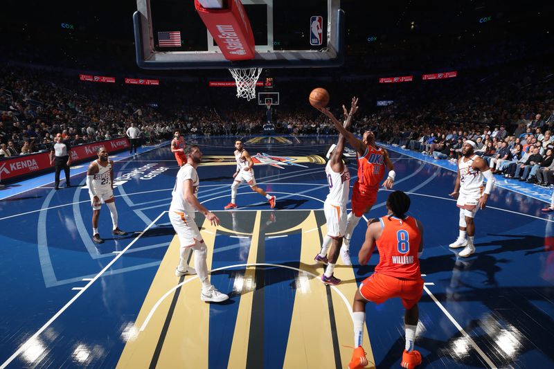 OKLAHOMA CITY, OK - NOVEMBER 15: Aaron Wiggins #21 of the Oklahoma City Thunder drives to the basket during the game against the Phoenix Suns during the Emirates NBA Cup game on November 15, 2024 at Paycom Center in Oklahoma City, Oklahoma. NOTE TO USER: User expressly acknowledges and agrees that, by downloading and or using this photograph, User is consenting to the terms and conditions of the Getty Images License Agreement. Mandatory Copyright Notice: Copyright 2024 NBAE (Photo by Zach Beeker/NBAE via Getty Images)