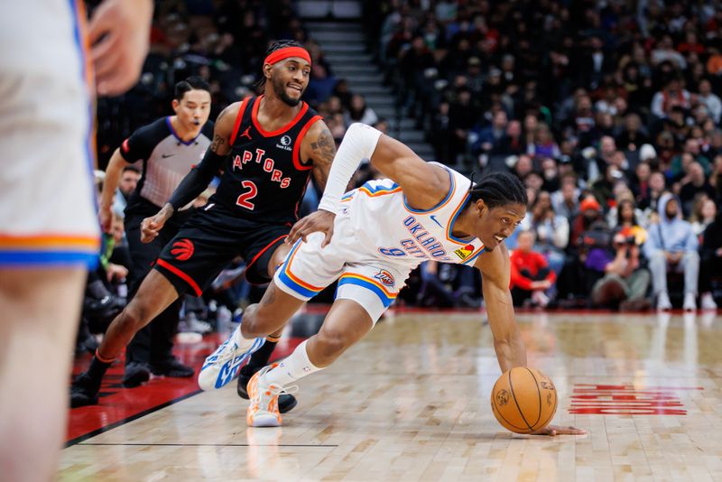 TORONTO, CANADA - MARCH 22: Jalen Williams #8 of the Oklahoma City Thunder gets control of a loose ball as Jalen McDaniels #2 of the Toronto Raptors trails behind in the first half of their NBA game at Scotiabank Arena on March 22, 2024 in Toronto, Canada. NOTE TO USER: User expressly acknowledges and agrees that, by downloading and or using this photograph, User is consenting to the terms and conditions of the Getty Images License Agreement. (Photo by Cole Burston/Getty Images)