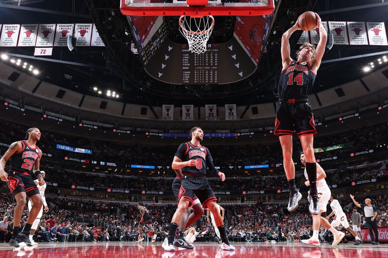 CHICAGO, IL - NOVEMBER 11: Matas Buzelis #14 of Chicago Bulls rebounds the ball during the game against the Cleveland Cavaliers on November 11, 2024 at United Center in Chicago, Illinois. NOTE TO USER: User expressly acknowledges and agrees that, by downloading and or using this photograph, User is consenting to the terms and conditions of the Getty Images License Agreement. Mandatory Copyright Notice: Copyright 2024 NBAE (Photo by Jeff Haynes/NBAE via Getty Images)