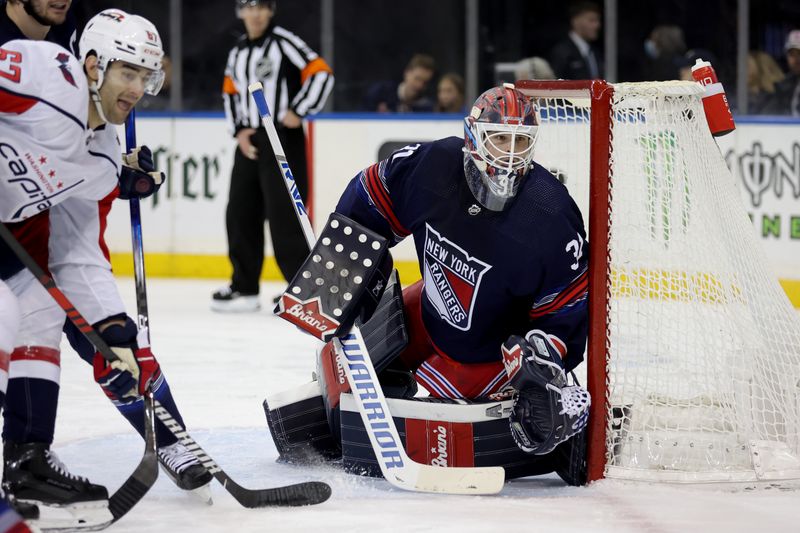 Jan 14, 2024; New York, New York, USA; New York Rangers goaltender Igor Shesterkin (31) tends net against Washington Capitals left wing Max Pacioretty (67) during the first period at Madison Square Garden. Mandatory Credit: Brad Penner-USA TODAY Sports