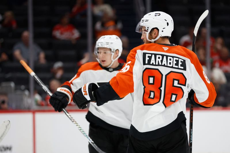 Sep 22, 2024; Washington, District of Columbia, USA; Joel Farabee (86) celebrates with teammates after scoring a goal against the Washington Capitals in the second period at Capital One Arena. Mandatory Credit: Geoff Burke-Imagn Images