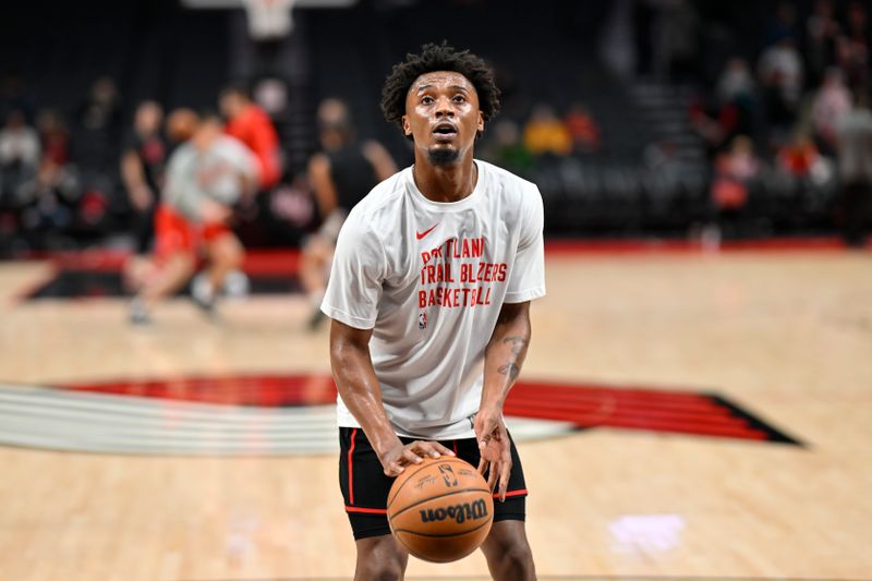 PORTLAND, OREGON - MARCH 08: Ashton Hagans #19 of the Portland Trail Blazers warms up before the game against the Houston Rockets at the Moda Center on March 08, 2024 in Portland, Oregon. NOTE TO USER: User expressly acknowledges and agrees that, by downloading and or using this photograph, User is consenting to the terms and conditions of the Getty Images License Agreement. (Photo by Alika Jenner/Getty Images)