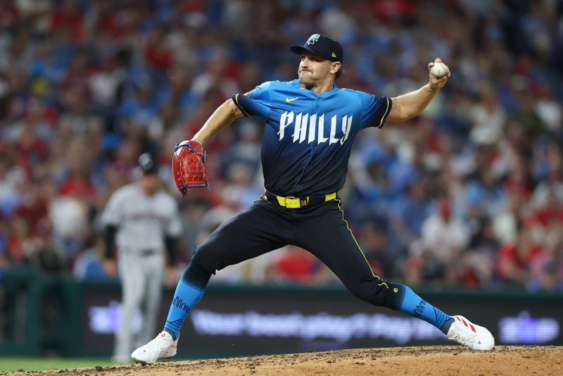 May 2, 2025; Philadelphia, Pennsylvania, USA; Philadelphia Phillies pitcher Tanner Banks (58) throws a pitch against the Arizona Diamondbacks during the seventh inning at Citizens Bank Park. Mandatory Credit: Bill Streicher-Imagn Images