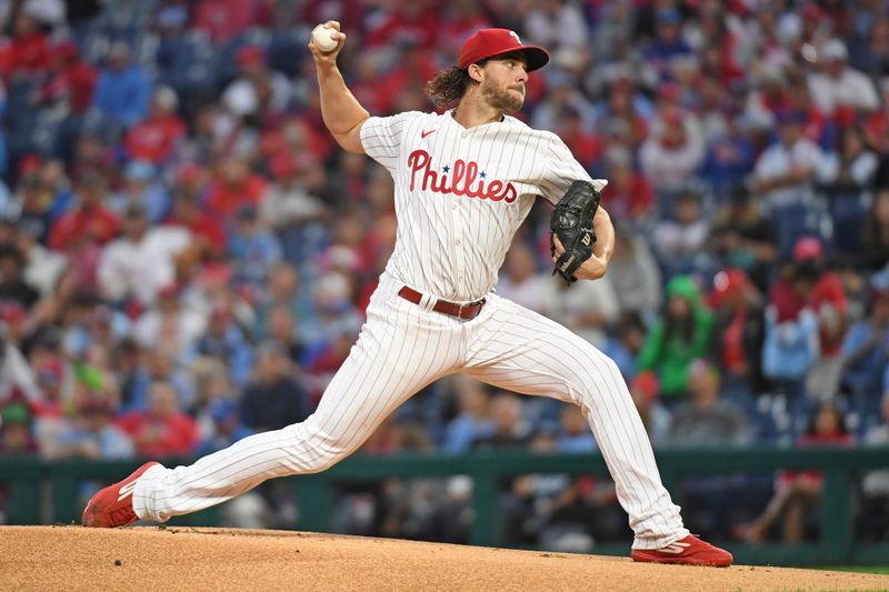 Sep 23, 2024; Philadelphia, Pennsylvania, USA; Philadelphia Phillies pitcher Aaron Nola (27) throws a pitch during the first inning against the Chicago Cubs at Citizens Bank Park. Mandatory Credit: Eric Hartline-Imagn Images