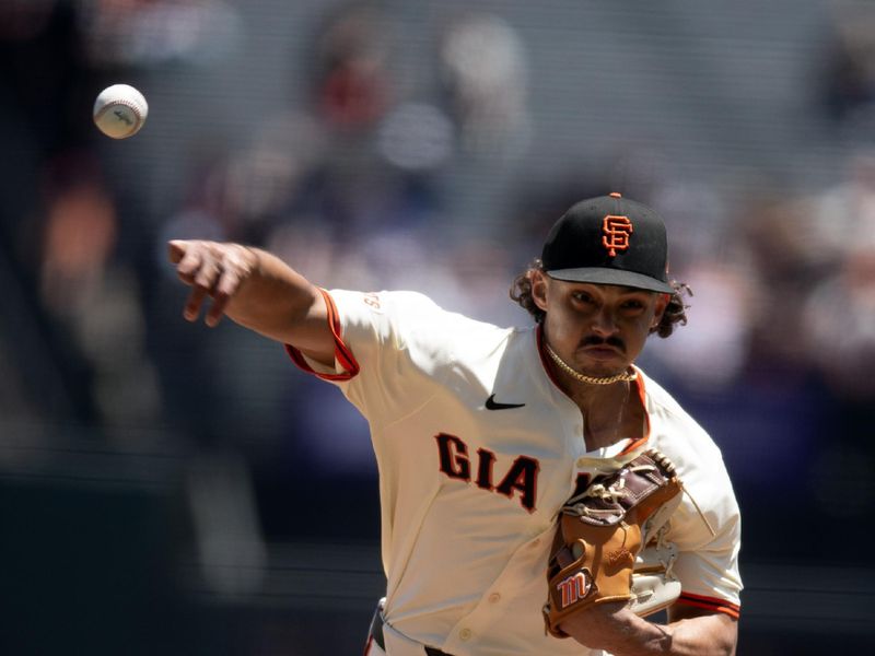 May 14, 2025; San Francisco, California, USA; San Francisco Giants starting pitcher Jordan Hicks (12) delivers a pitch against the Arizona Diamondbacks during the first inning at Oracle Park. Mandatory Credit: D. Ross Cameron-Imagn Images