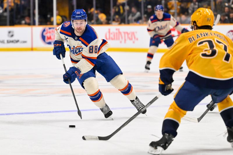 Jan 13, 2026; Nashville, Tennessee, USA;  Edmonton Oilers left wing Andrew Mangiapane (88) brings the puck up ice against the Nashville Predators during the second period at Bridgestone Arena. Mandatory Credit: Steve Roberts-Imagn Images