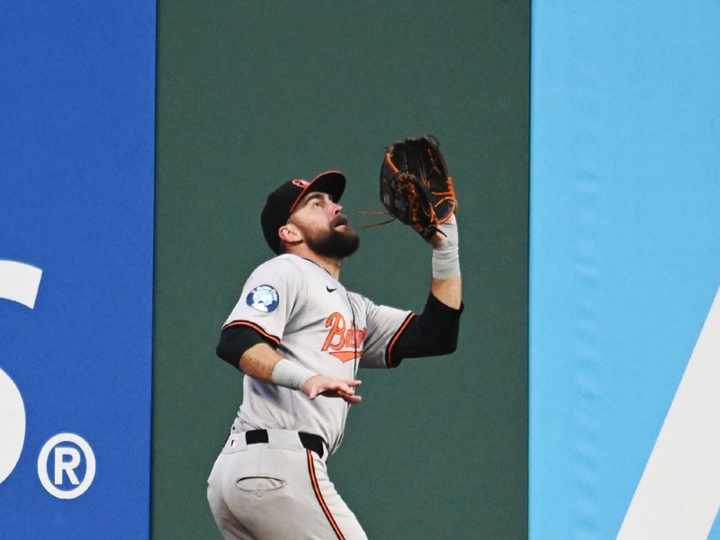 Aug 2, 2024; Cleveland, Ohio, USA; Baltimore Orioles center fielder Cedric Mullins (31) catches a ball hit by Cleveland Guardians second baseman Andres Gimenez (not pictured) during the fourth inning at Progressive Field. Mandatory Credit: Ken Blaze-USA TODAY Sports