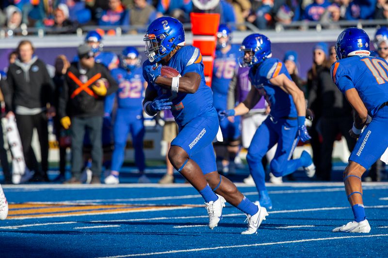 Dec 3, 2022; Boise, Idaho, USA;  Boise State Broncos running back Ashton Jeanty (2) runs around left end during the first half of the Mountain West Championship game versus the Fresno State Bulldogs at Albertsons Stadium. Mandatory Credit: Brian Losness-USA TODAY Sports

