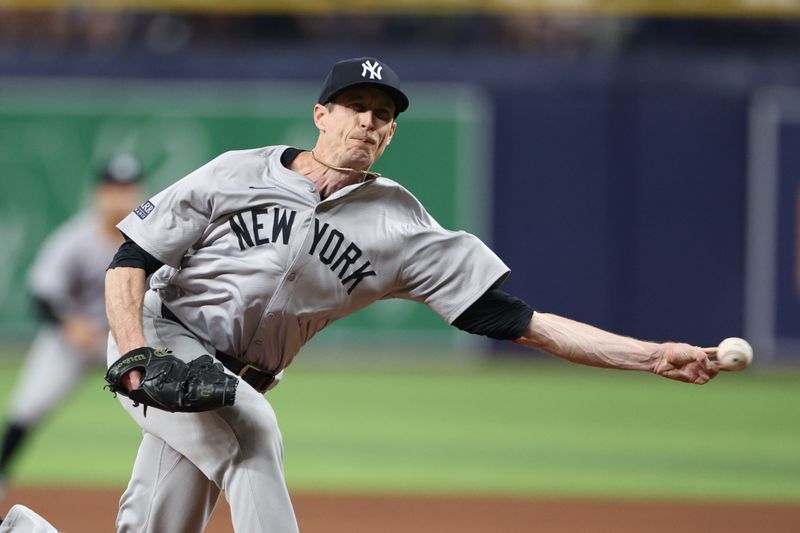 Jul 10, 2024; St. Petersburg, Florida, USA;  New York Yankees pitcher Tim Hill (54) throws a pitch against the Tampa Bay Rays in the sixth inning at Tropicana Field. Mandatory Credit: Nathan Ray Seebeck-USA TODAY Sports