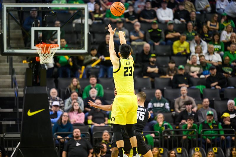 Jan 20, 2026; Eugene, Oregon, USA; Oregon Ducks guard Wei Lin (23) shoots the ball against the Oregon Ducks during the second half at Matthew Knight Arena. Mandatory Credit: Craig Strobeck-Imagn Images