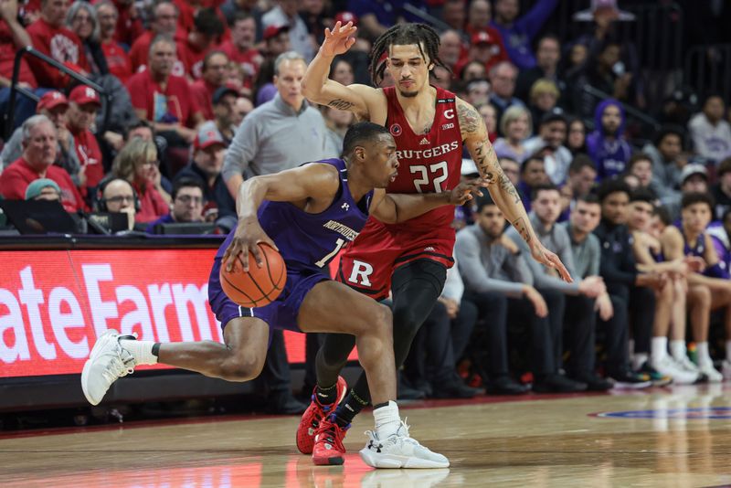 Mar 5, 2023; Piscataway, New Jersey, USA; Northwestern Wildcats guard Chase Audige (1) dribbles up court against Rutgers Scarlet Knights guard Caleb McConnell (22) during the second half at Jersey Mike's Arena. Mandatory Credit: Vincent Carchietta-USA TODAY Sports