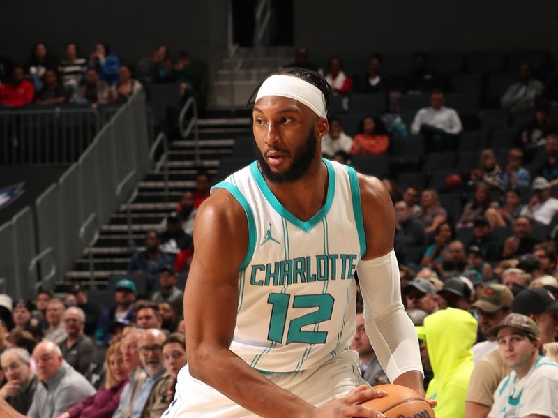 CHARLOTTE, NC - JANUARY 29: Josh Okogie #12 of the Charlotte Hornets handles the ball during the game against the Brooklyn Nets on January 29, 2025 at Spectrum Center in Charlotte, North Carolina. NOTE TO USER: User expressly acknowledges and agrees that, by downloading and or using this photograph, User is consenting to the terms and conditions of the Getty Images License Agreement. Mandatory Copyright Notice: Copyright 2025 NBAE (Photo by Kent Smith/NBAE via Getty Images)