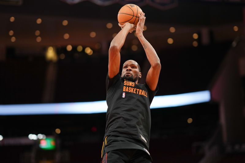 HOUSTON, TEXAS - DECEMBER 27: Kevin Durant #35 of the Phoenix Suns shoots the ball during warmups prior to the game against the Houston Rockets at Toyota Center on December 27, 2023 in Houston, Texas. User expressly acknowledges and agrees that, by downloading and or using this photograph, User is consenting to the terms and conditions of the Getty Images License Agreement. (Photo by Alex Bierens de Haan/Getty Images)