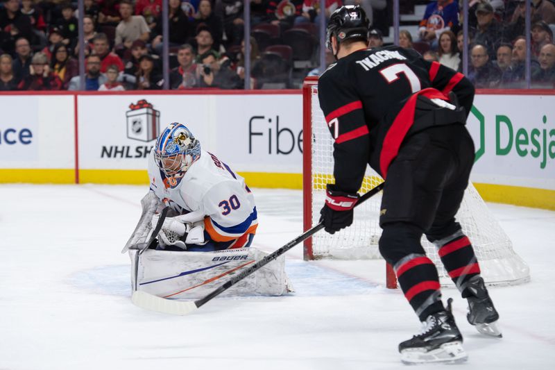 Dec 8, 2024; Ottawa, Ontario, CAN; New York Islanders goalie Ilya Sorokin (30) makes a save in front of Ottawa Senators left wing Brady Tkachuk (7) in the first period at the Canadian Tire Centre. Mandatory Credit: Marc DesRosiers-Imagn Images