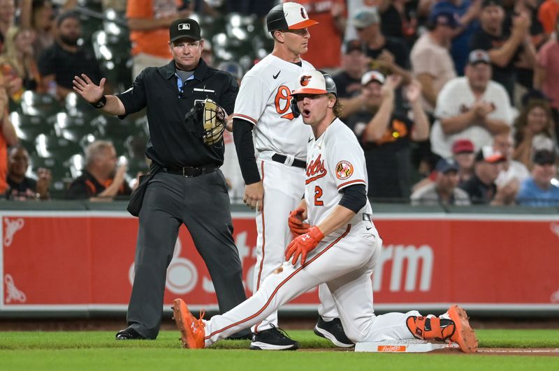 Sep 13, 2023; Baltimore, Maryland, USA;  Baltimore Orioles third baseman Gunnar Henderson (2) reacts after hitting a ninth inning triple against the St. Louis Cardinals at Oriole Park at Camden Yards. Mandatory Credit: Tommy Gilligan-USA TODAY Sports