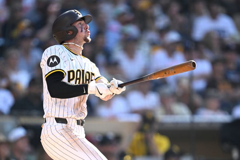 Jun 22, 2024; San Diego, California, USA; San Diego Padres center fielder Jackson Merrill (3) hits a three-run home run against the Milwaukee Brewers during the fourth inning at Petco Park. Mandatory Credit: Orlando Ramirez-USA TODAY Sports